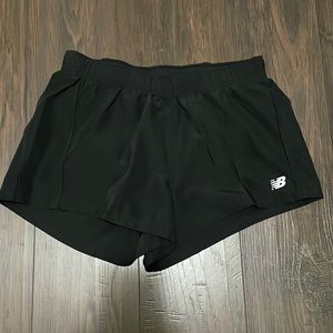 NEW BALANCE SIZE XS RUNNING SHORTS.